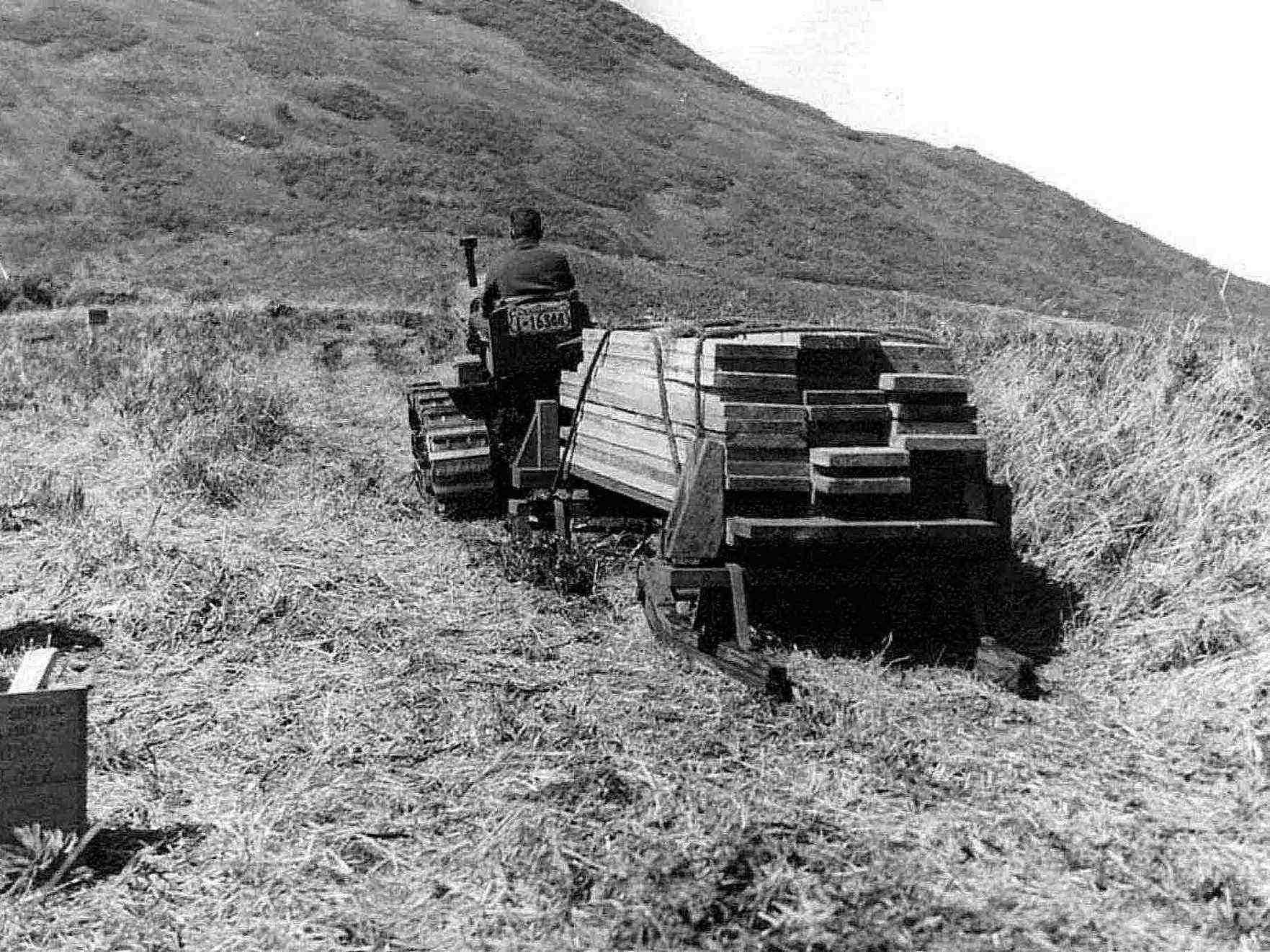 Tractor-hauling-weir-lumber-old-vintage-history-photo